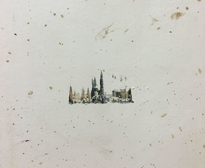 Someone Bumped Into A Wall At Work And Made A Painting Of A Snowy Town