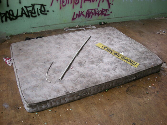 A Stack Of Old And Dusty Mattresses