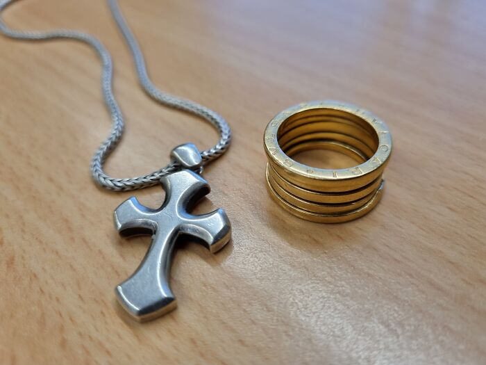 My Wedding Ring (18 Years - Still Going Strong) And The First Piece Jewelry My Wife Bought Me Shortly After Getting Married. Besides For This Pic I Always Wear Them, Always Will