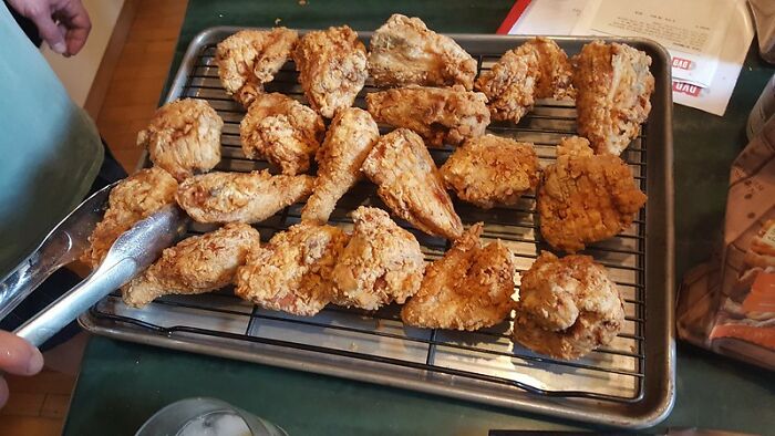 Making "Fried Chicken" By Tossing Chicken In Plain Flour And Baking Them