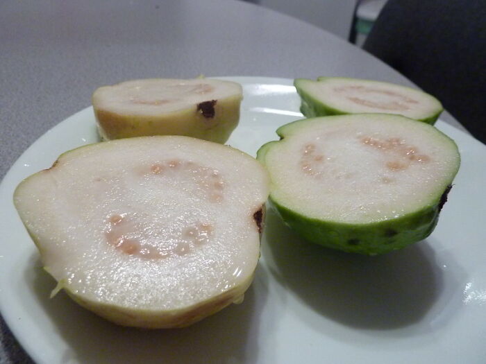 Throwing Away The "The Fleshy Seedy Inside" Of Guavas 