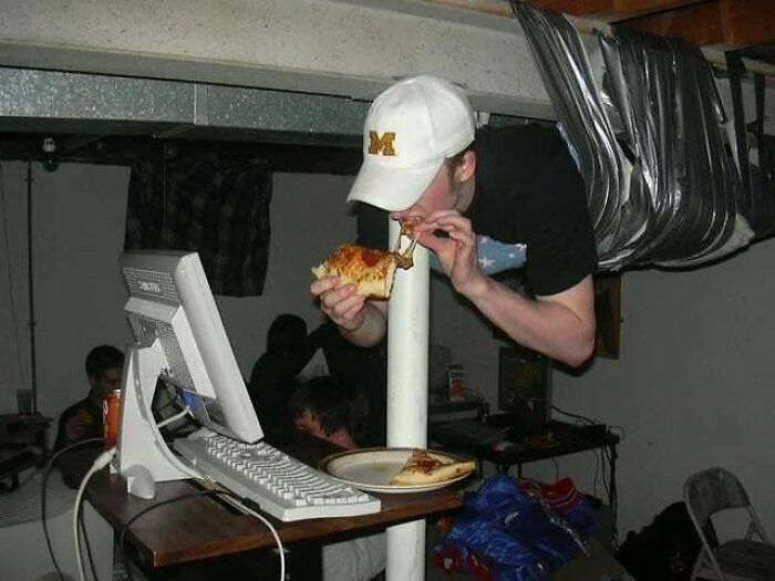 A Rare Angle Of The Infamous 2002 Counterstrike Lan Party Where A Guy Is Ducttaped To The Ceiling. Swipe For The Original Picture