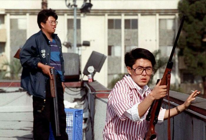 April 30, 1992. Korean American Business Owners, Now Called “Roof Koreans,” Fend Off Rioters In South Central Los Angeles