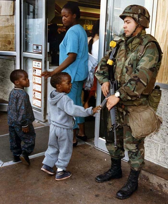 May 3, 1992. A U.S. Marine Guards A Supermarket In Compton During The Los Angeles Riots