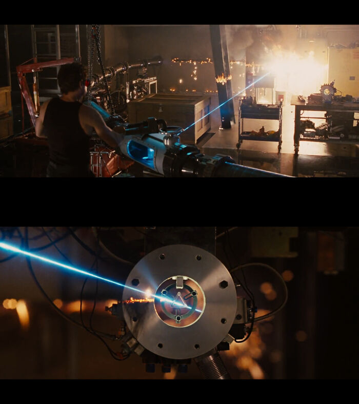 [iron Man 2 2010] The Beam From Particle Accelerator Cuts Through Everything But The Wires (Lower Frame) Going To The New Triangular Arc Reactor Core