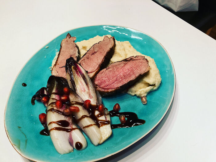A Christmas Dinner - Roast Duck On Celery Purée With Grilled Radicchio And Pomegranate Seeds