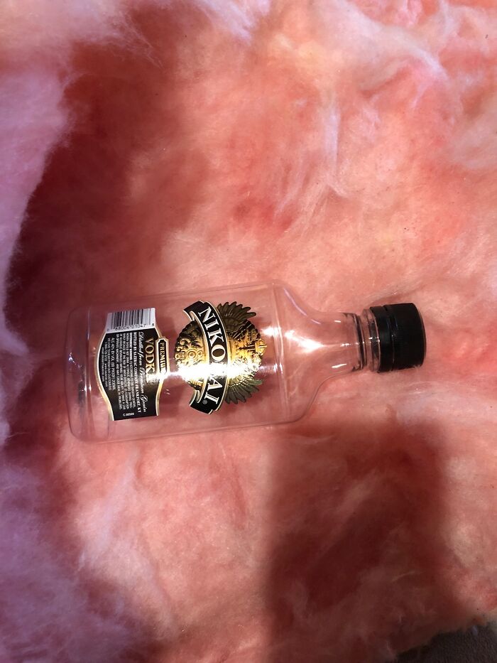 Bottle Of Vodka Tucked Inside The Insulation