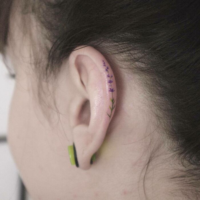 ear tattoo of a flower