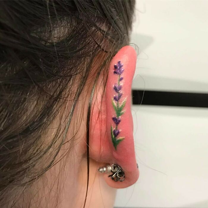 ear tattoo of a lavender flower