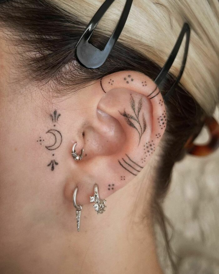 Subtle and Elegant Ear Tattoo