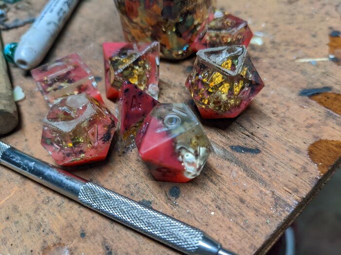 I Make D&d Dice From Resin. I'm Currently Working On 3D Modeling And Printing Master Dice/Blanks So I Can Make New Molds Because These Don't Work Very Well, Some Of The Dice In This Picture Have Holes I Had To Refill.