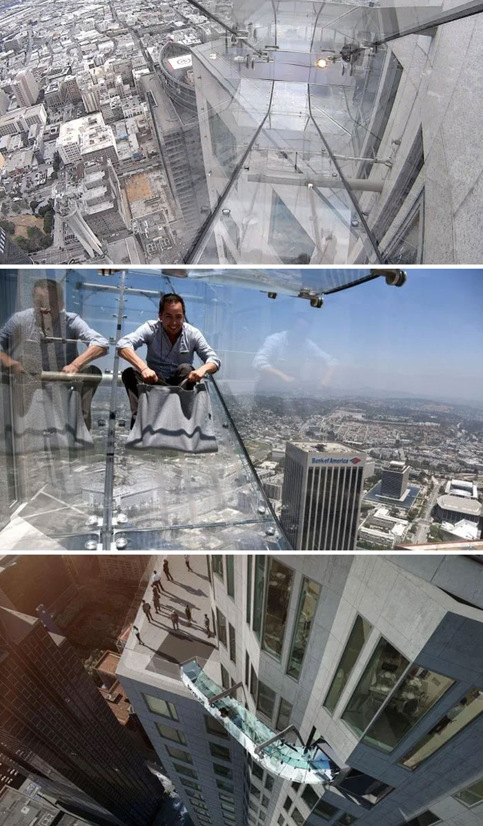 Skyslide At OUE Skyspace In Los Angeles, CA | An Outdoor Glass Slide That’s Attached To The Exterior Of The U.S. Bank Tower. The Skyslide Is 45 Feet Long, About Four Feet Wide And Made Entirely With 1.25-Inch Glass. Visitors Glide From The 70th To The 69th Floor. Now Permanently Closed
