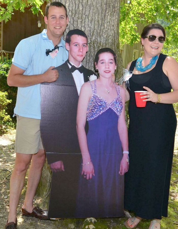 My Wife And I Standing Next To Cardboard Cutouts Of Our High School Prom Photo