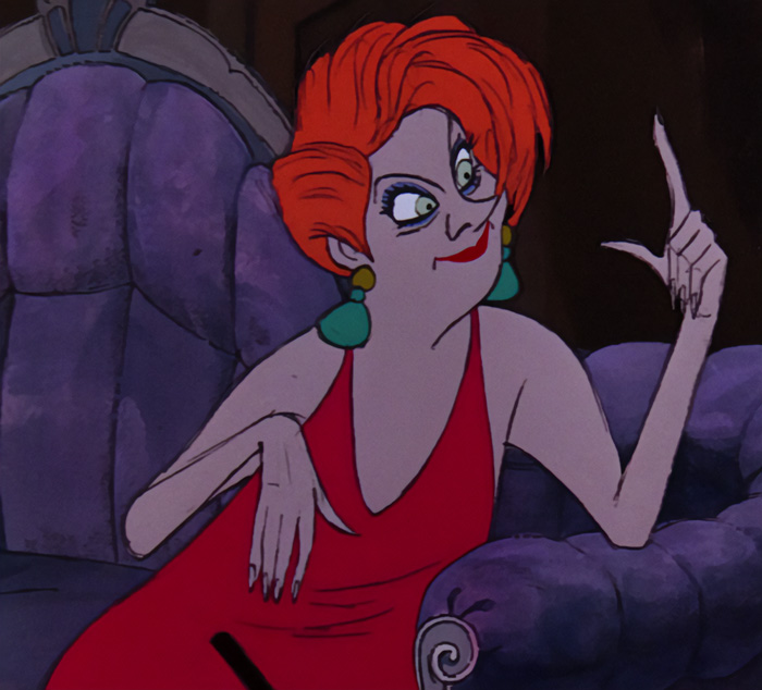 Madame Medusa wearing red dress 