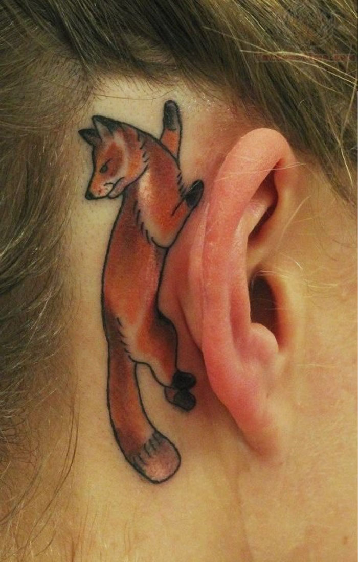 ear tattoo of a lying fox