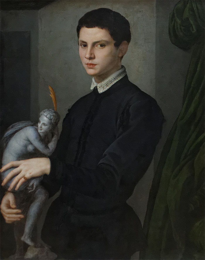 Man Holding A Statuette By Bronzino