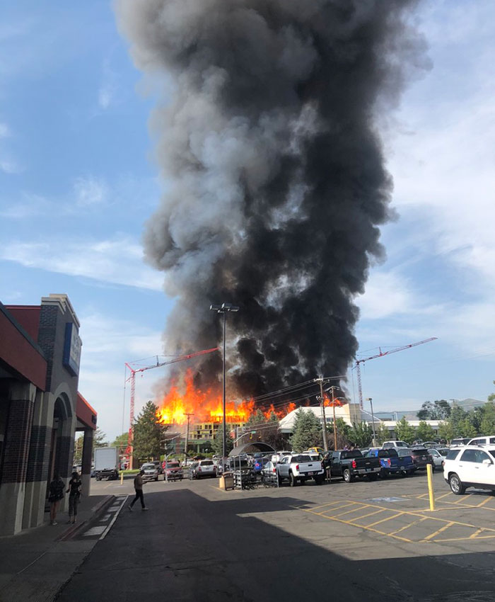 Alarm Fire In Salt Lake City. New Apartments Under Construction Burned Up And Took 12 Businesses With It Including A Porsche Dealership. 65 Firefighters Attended