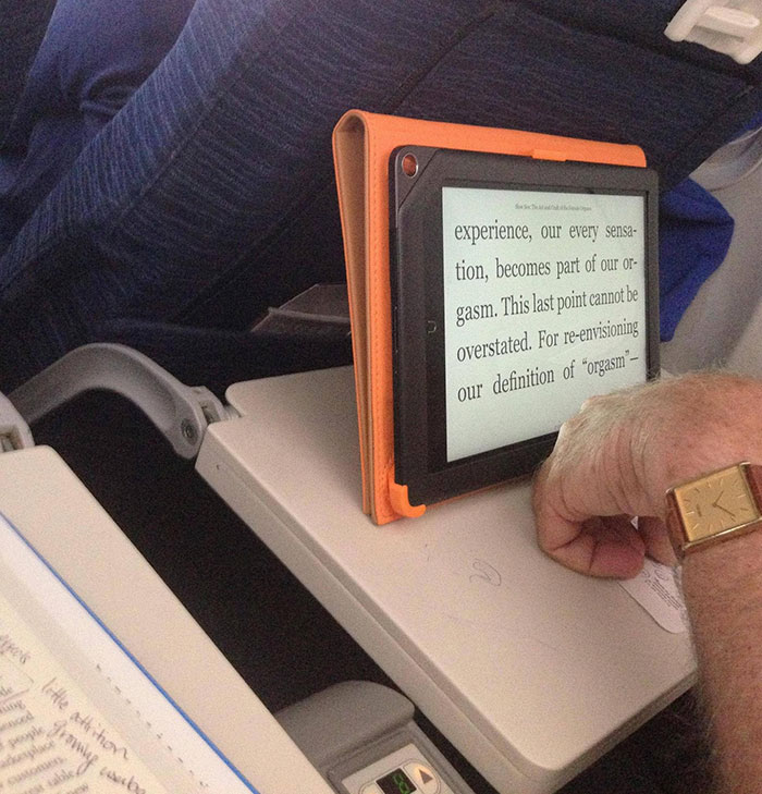 A 75-Year-Old Bifocal-Wearing Male Passenger Needs A Massive Font Size On His E-Reader To Read An Adult Book. Get Me Off This Plane
