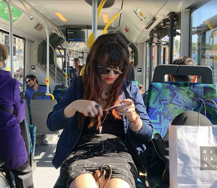 This Woman Cutting Her Hair On The Bus