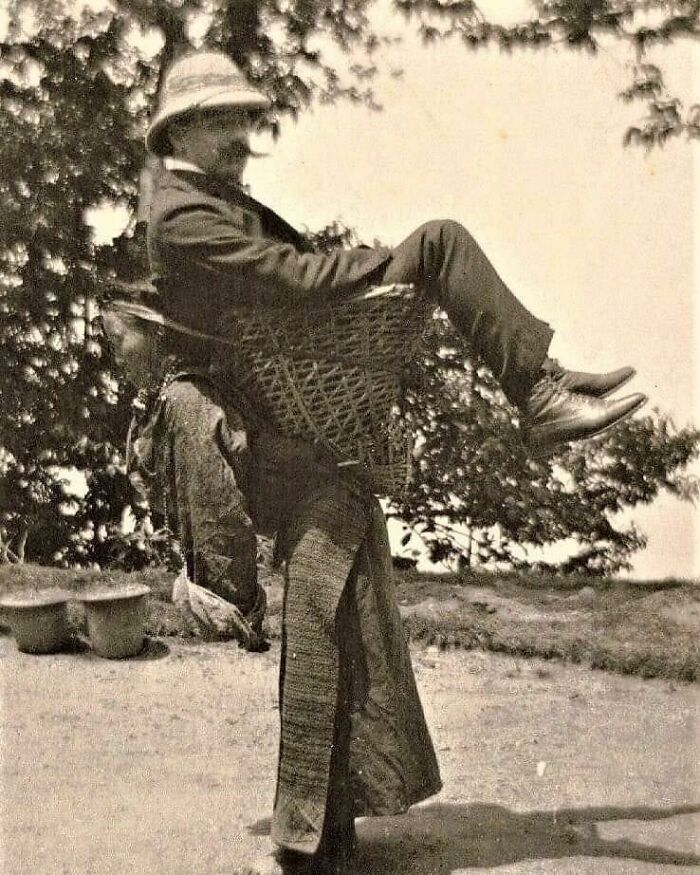 A Sikkimese Woman Carrying A British Man On Her Back, West Bengal. India 1900