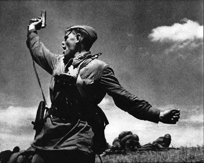 This Image Captured During World War II By Soviet War Reporter Max Alpert Depicts Soviet Red Army Political Commissar Alexey Yeremenko As He Raises A Tokarev Tt-33 Handgun And Leads His Men In Combat Against The Germans On July 12th, 1942