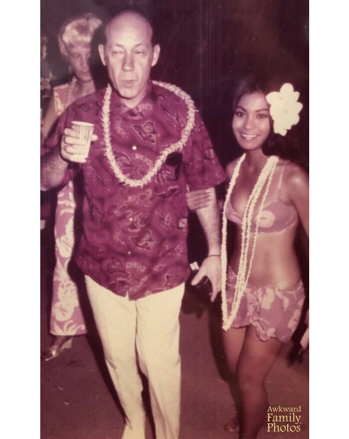 “My Grandparents In Hawaii In The Early 70’s. And No, That’s Not Grandma On The Right. She’s On The Left Giving The Stink Eye. If Looks Could Kill, That Hula Girl Wouldn’t Live To See Her Next Luau”