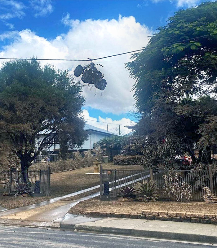 Quad Bike Hanging From The Power Lines After Record-Breaking Floods In Eastern Australia