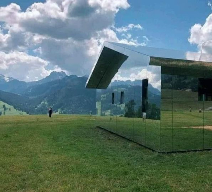 A House With A Mirror Surface So As Not To Spoil The Landscape Of Gstaad, Switzerland