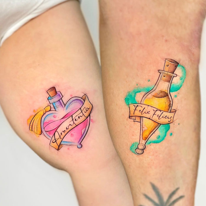 Harry Potter tattoos of potion bottles: Amortentia and Felix Felicis, in vibrant watercolor style.