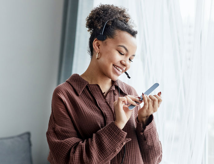 Woman talking and manicure nails