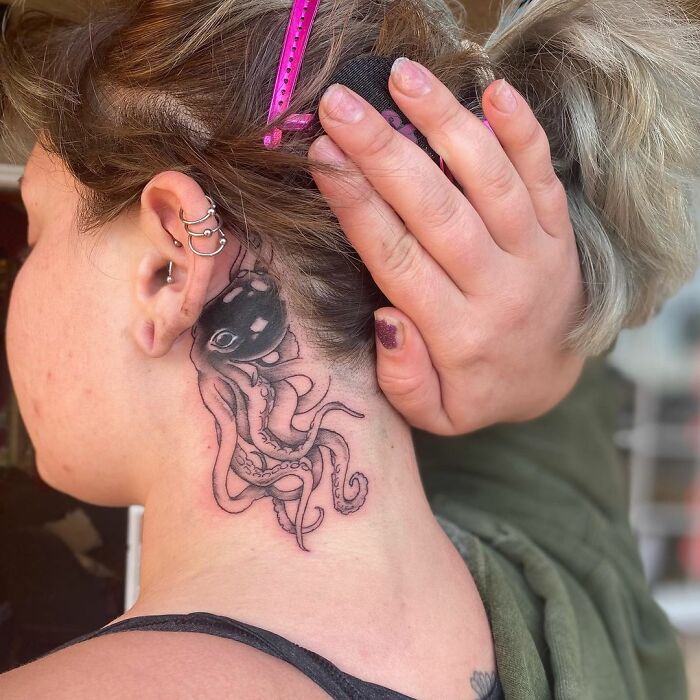 ear tattoo of an octopus 