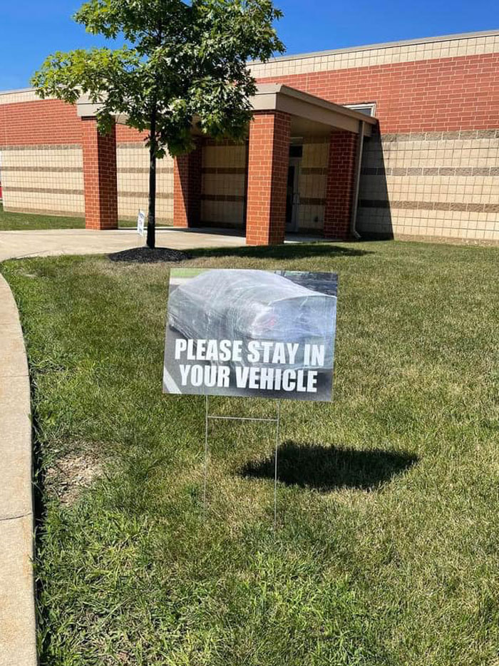 7 Funny Drop-Off Lane Signs Put Up By This Elementary School Are Cracking Parents Up
