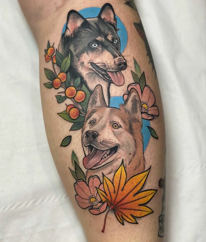 Two dogs calf tattoo 