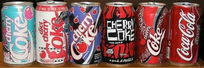 An Array Of Retro Cherry Coke Can Designs