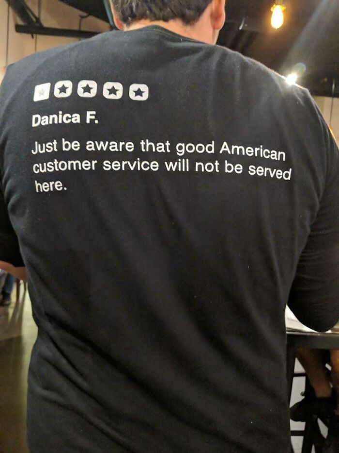 This Restaurant Wears 1 Star Yelp Reviews Behind Their T-Shirts