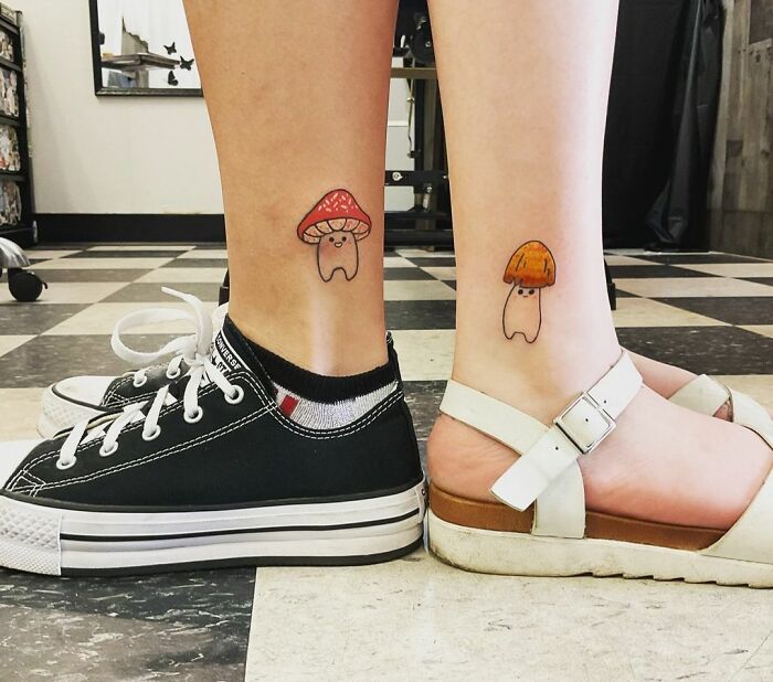 Cute matching mushroom leg tattoos