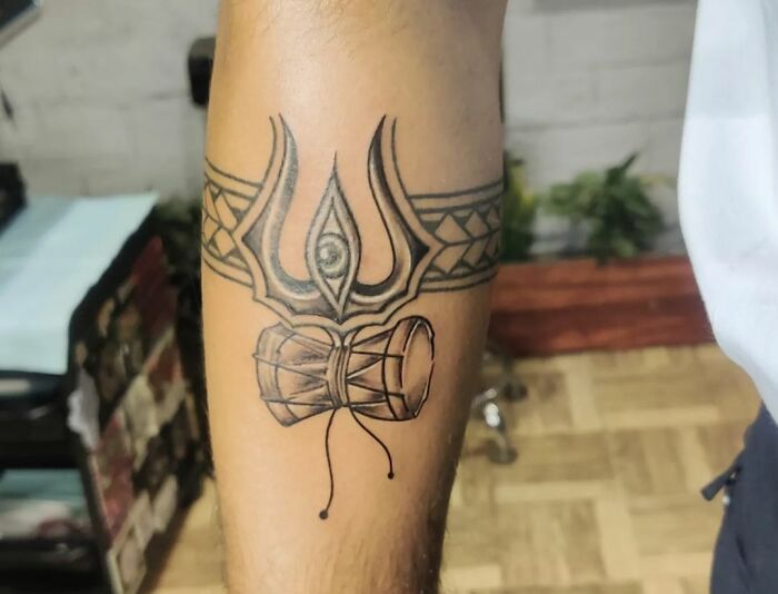 Check Out This Band Tattoo With The Elements Of Shiva