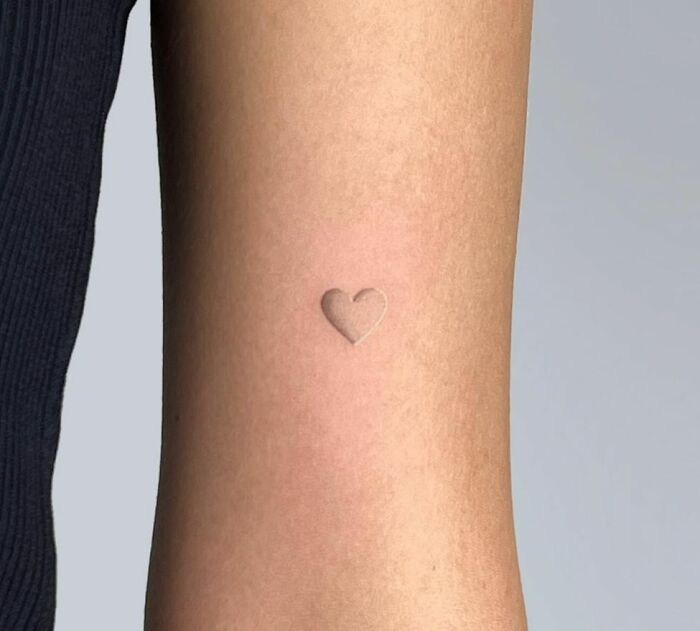 18 Beautifully Subtle White Ink Tattoo Ideas
