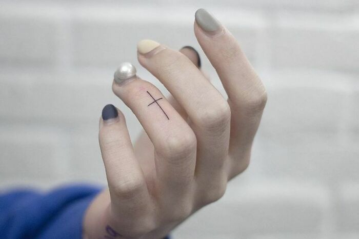 Finger Cross Tattoo