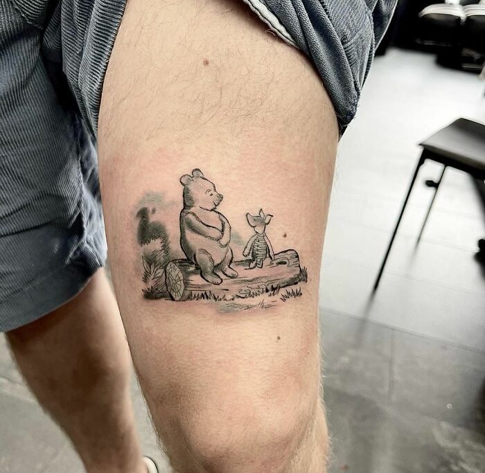 Pooh and Tigger tattoo on the ankle