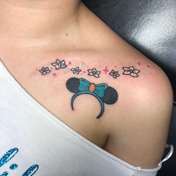 Mickey Mouse ears based off Princess Jasmine collarbone tattoo