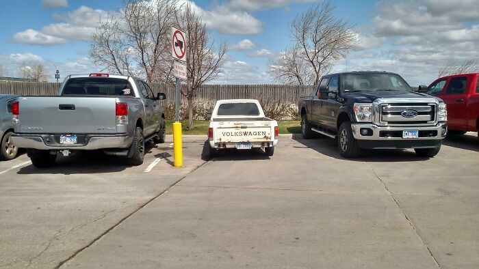 My Volkswagen Rabbit Looks Like A Toy Next To These Normal Trucks 