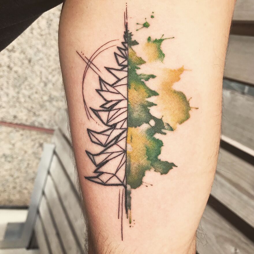 watercolor and geometric tree tattoo on the arm