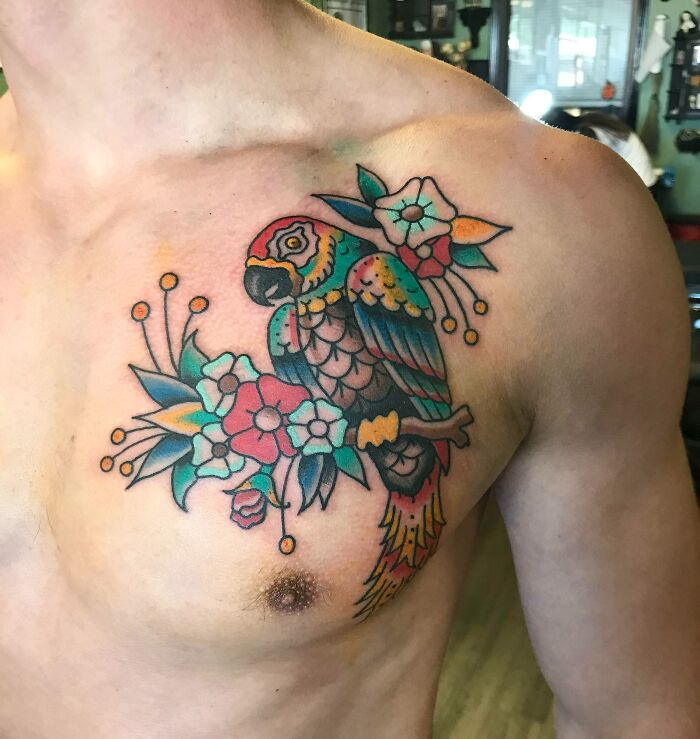 Parrot with flowers tattoo 