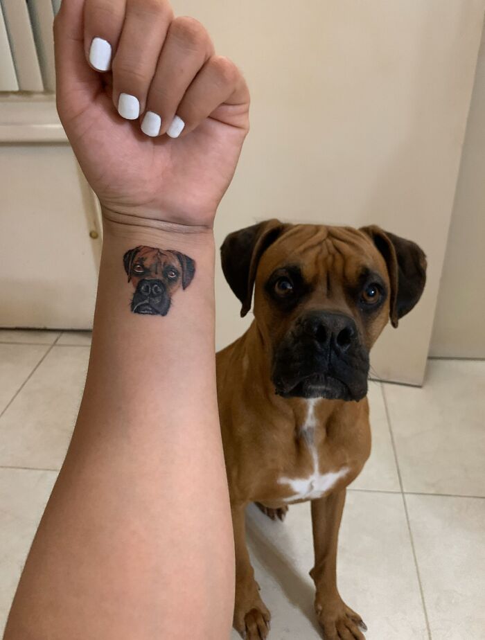 Dog's face wrist tattoo 