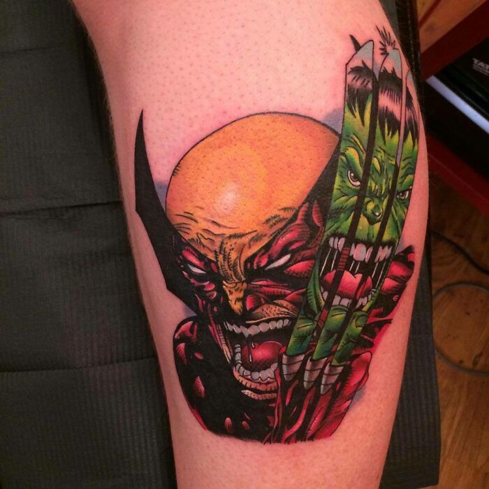 Marvel tattoo featuring Wolverine's face and claws, with vivid colors and intricate details on arm.