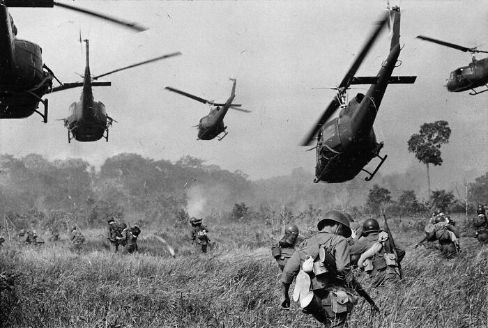 U.S. Helicopters Pour Machine-Gun Fire Into The Tree Line To Cover The Advance Of South Vietnamese Troops Ca, 1965 