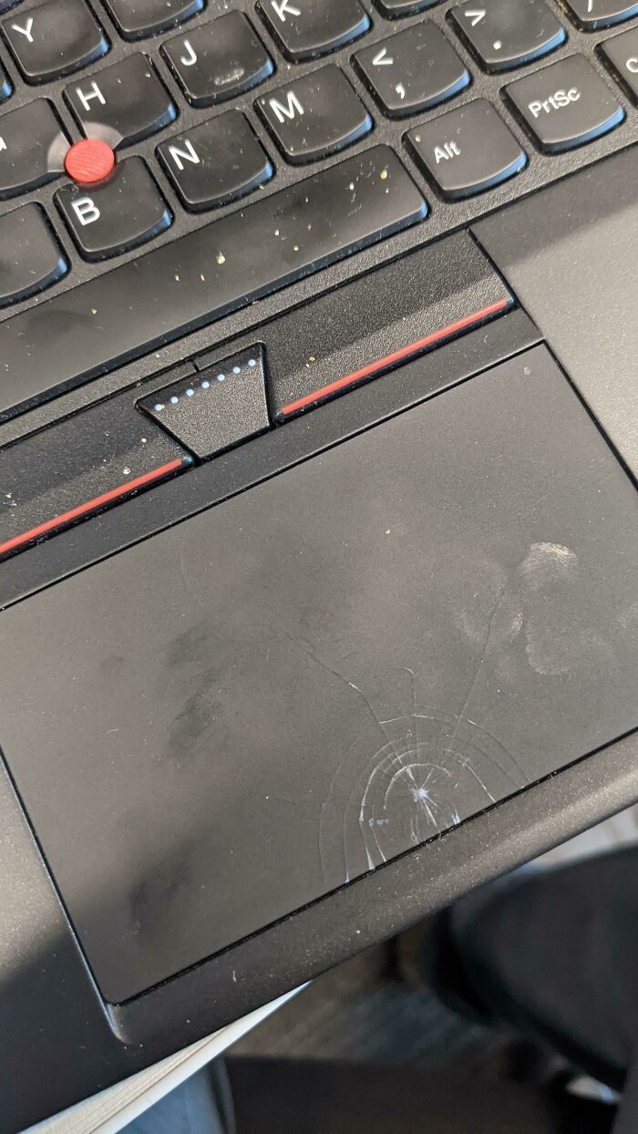 Ignoring The Filthy Keyboard, This Thinkpad's Trackpad Was Cracked By Sheer Finger Pressure