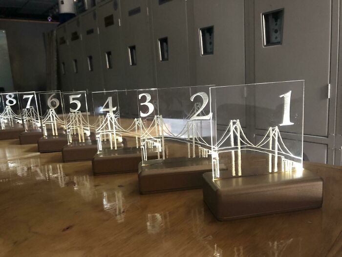 My Sister Wanted Lit LED Table Numbers So I Put These Together For Her! The Bases As 3D Printed To Hide The Wires. My Daughter (Their Niece) Sketched The Bridge Where They Got Engaged And I Then Laser Engraved The Sketch Into Clear Acrylic So It Would Glow. Really Happy With How These Turned Out!