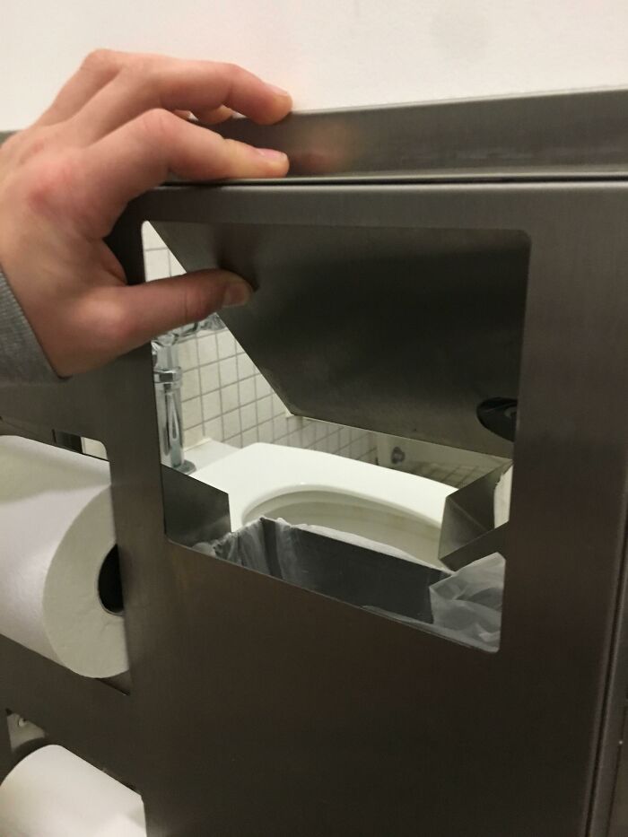 This Toiletry Trash Can That Opens Into The Other Stall